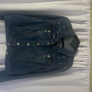 Distressed stretchy denim jacket.